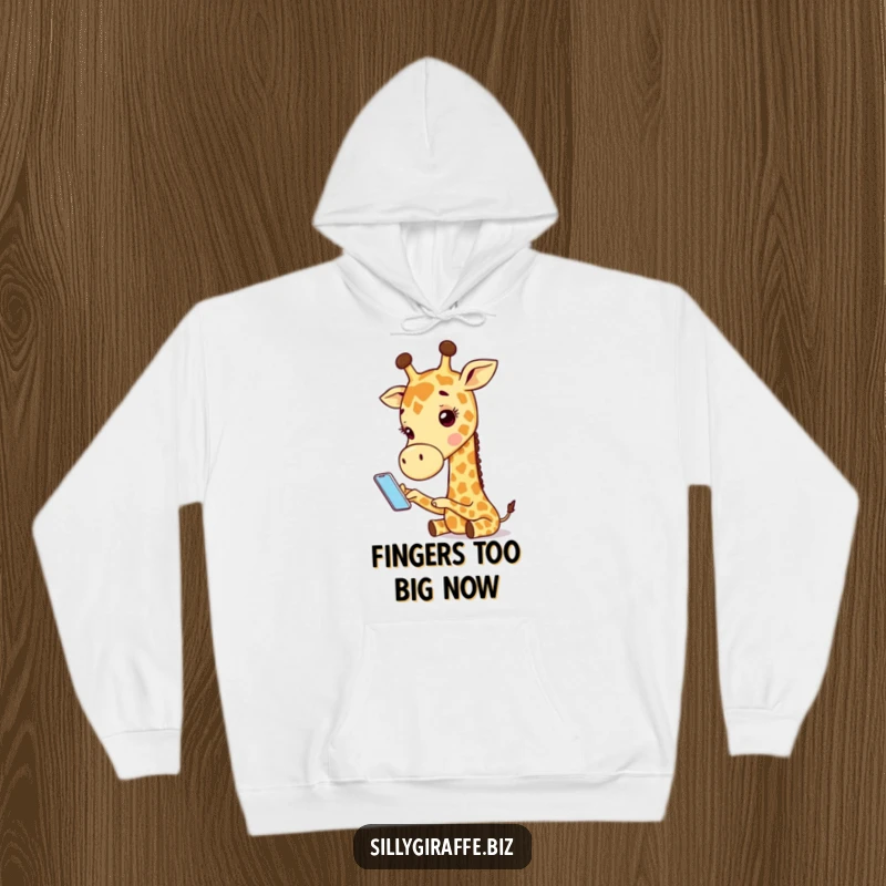 Funny hoodie with an adorable giraffe character struggling to use a tiny phone, offering humorous comfort and a touch of tech satire.